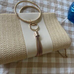 tan and cream clutch